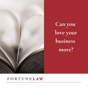 Photo of pages of a book heart shaped. Text "Can you love your business more?" Above Fortune Law's logo.