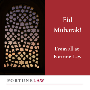 Photo of geometric patterned window, next to the text Eid Mubarak from all at Fortune Law! Above the firm logo.